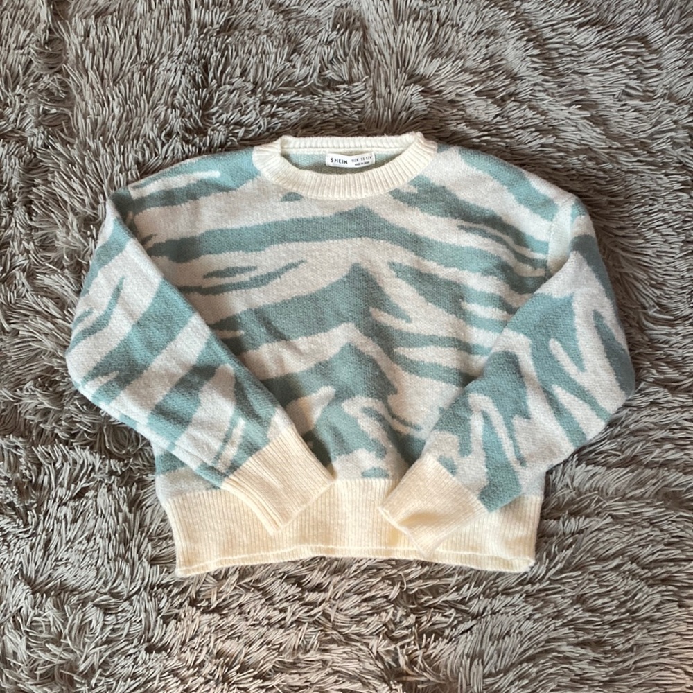 super cute sweater!